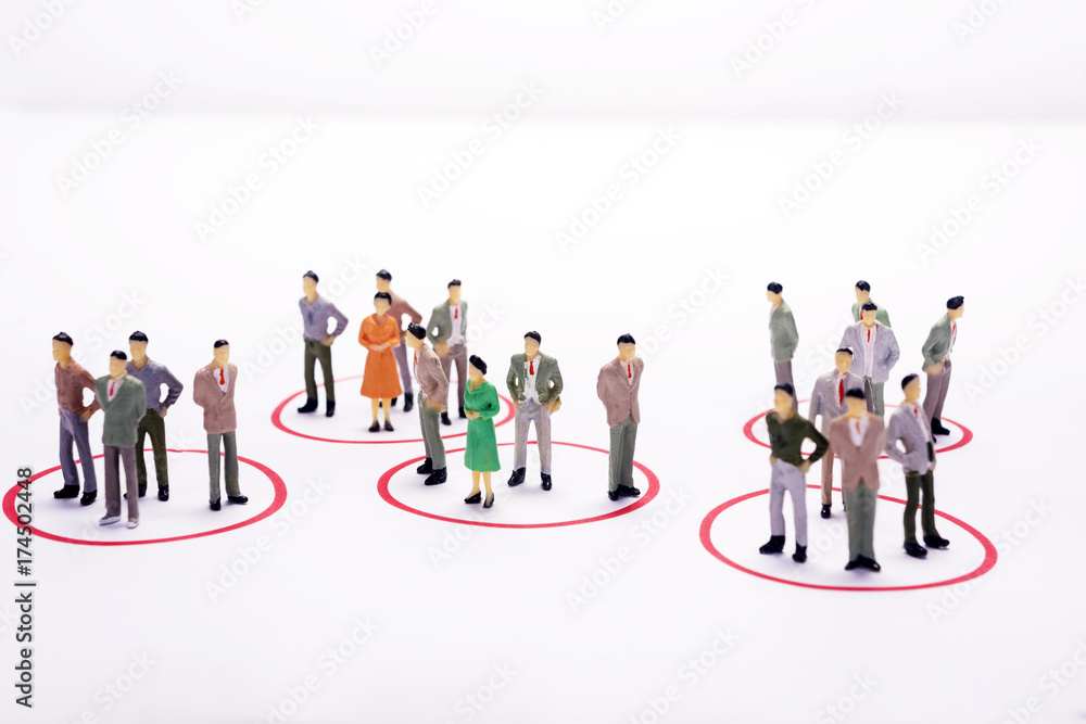 Miniature business people in conection scheme over white backdrop or background.