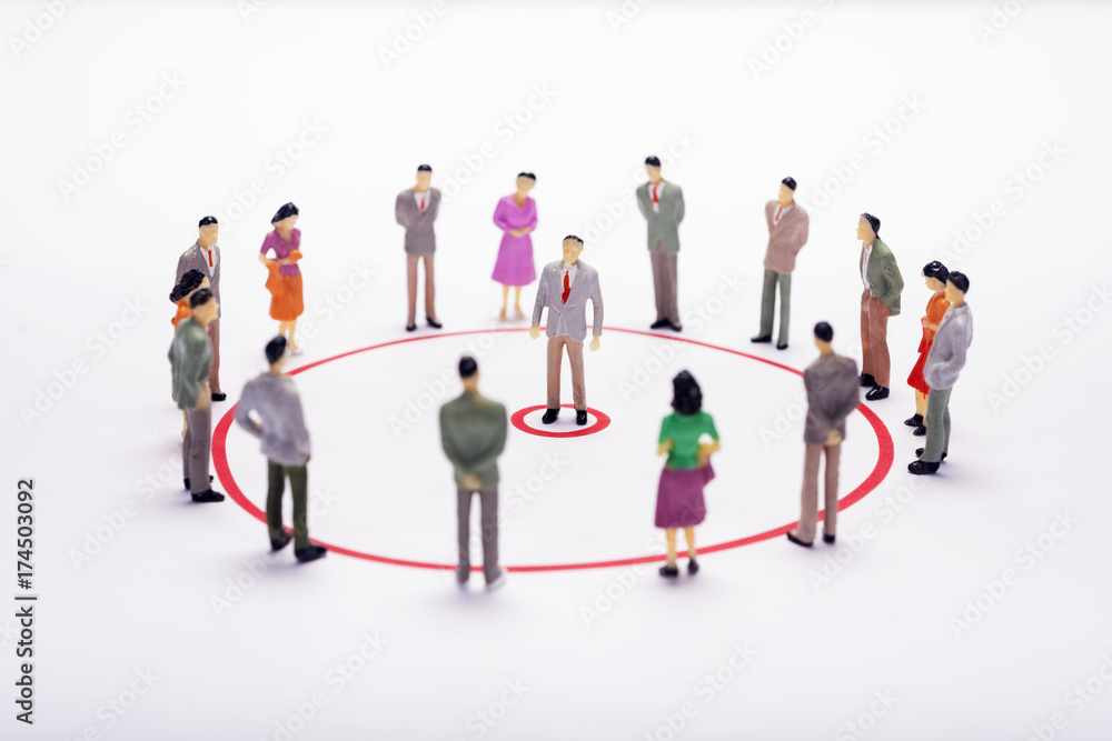 Miniature business people in conection scheme over white backdrop or background. Miniature business people in conection scheme over white backdrop or background.