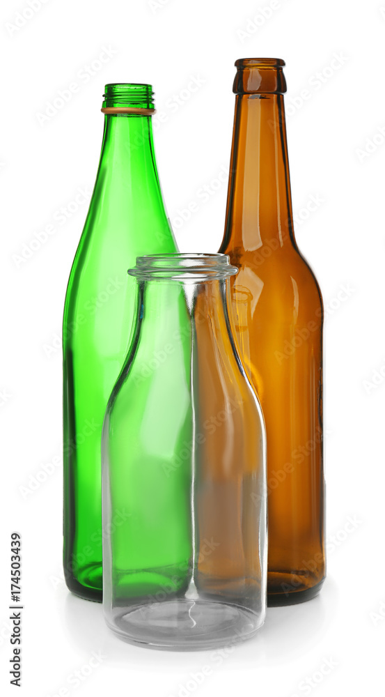 Empty glass bottles on white background Empty glass bottles on white background