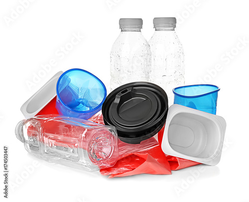 Pile of plastic garbage on white background