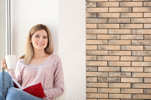 Young beautiful woman with ...