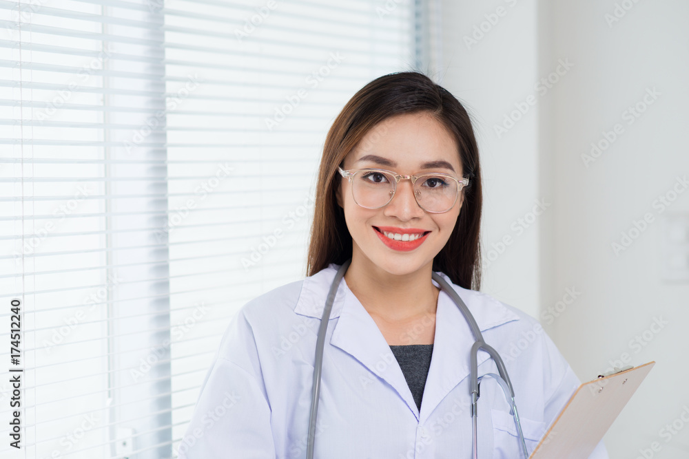 Portrait confident young female doctor medical professional Portrait confident young female doctor medical professional
