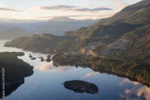 Beautiful aerial view on the Canadian Mountain Landscape during a vibrant evening before sunset. Taken in Sechelt Inlet, Sunshine Coast, British Columbia, Canada. 