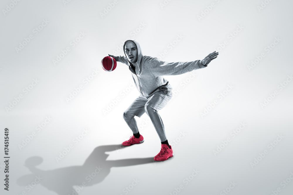 Full length portrait of a basketball player with ball Full length portrait of a basketball player with ball