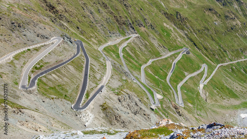 View of serpentine road of Stelvio Pass from above.