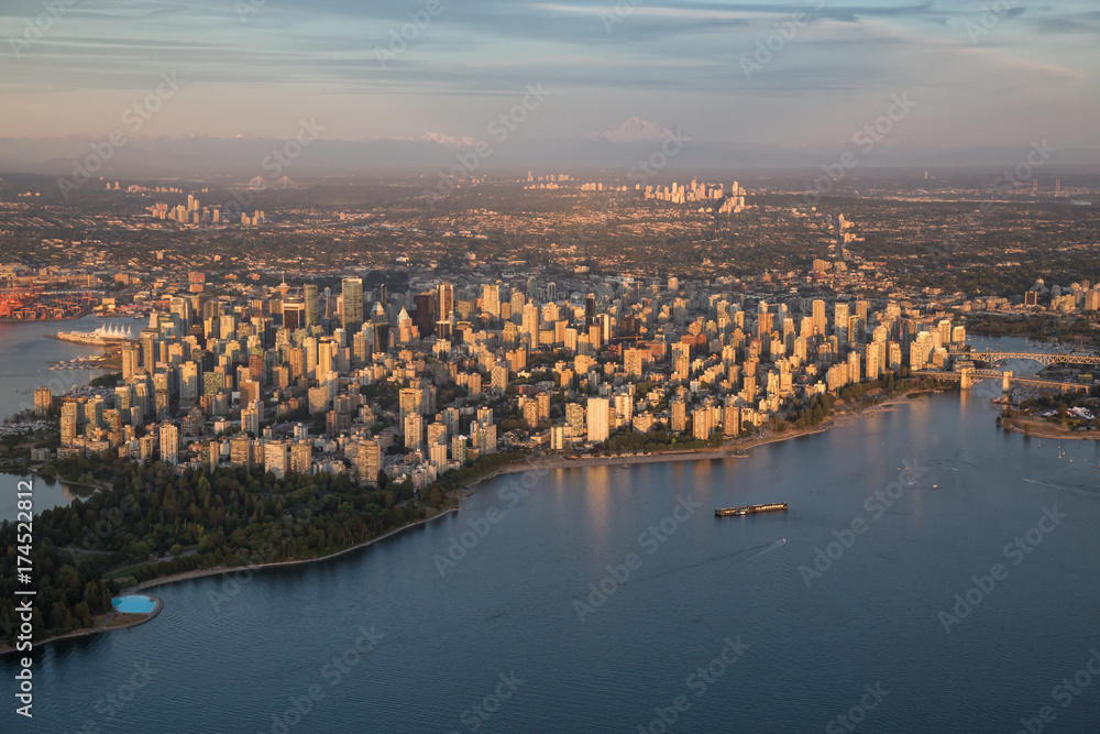 Naklejka premium Aerial view of the Downtown City Landscape during a colorful and vibrant sunset. Taken in Vancouver, British Columbia, Canada.