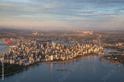 Aerial view of the Downtown City Landscape during a colorful and vibrant sunset. Taken in Vancouver  British Columbia  Canada.