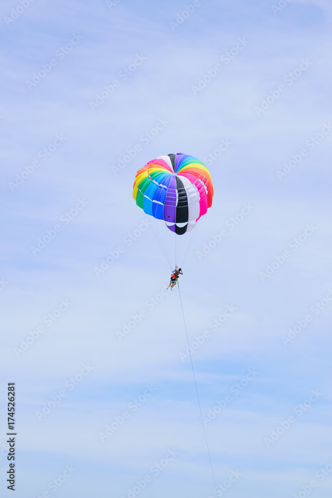 Fototapeta premium The sky parachute has a blue backdrop background.