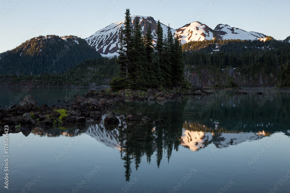 Beautiful morning view on a famous hiking spot, Garibaldi Lake, during a vibrant summer sunrise. Located near Squamish and Whistler, North of Vancouver, BC, Canada.
