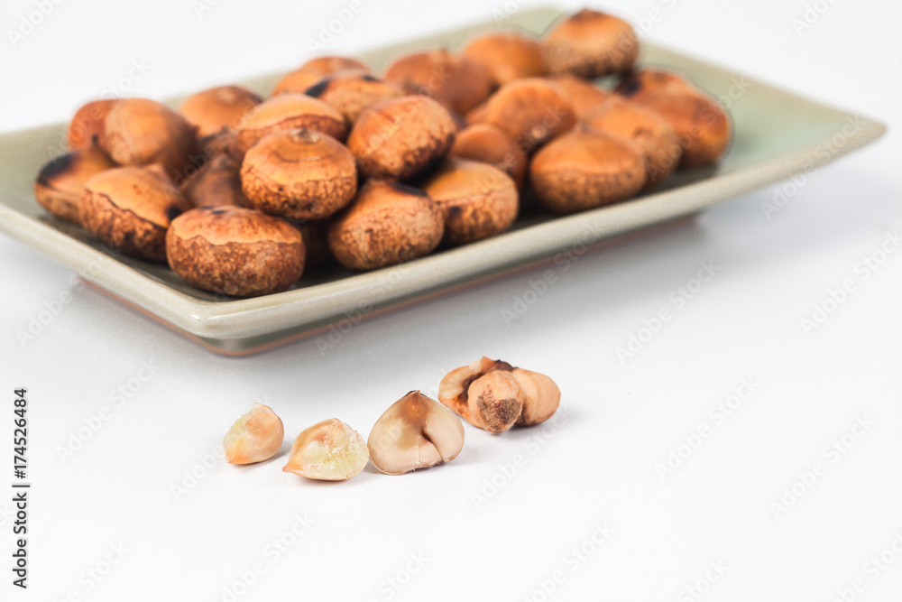Fototapeta premium Chestnuts food on dish from rain forest