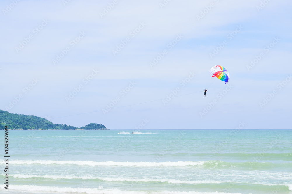 Parachutes in the sky float over the Andaman Sea. Parachutes in the sky float over the Andaman Sea.