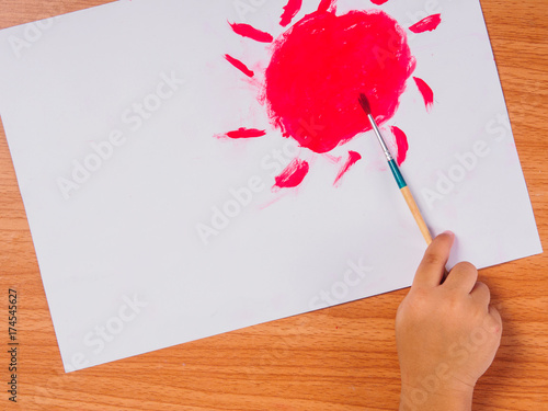 hand with brush painting