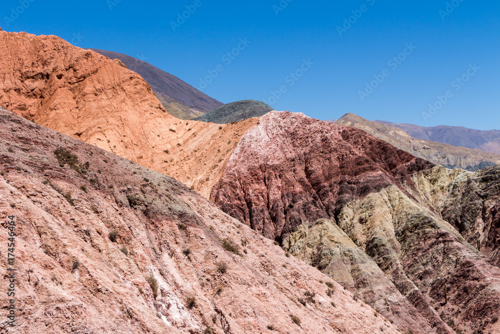 Purmamarca, hills of several colors among which predominates red, violet, purple, pink, orange, brown