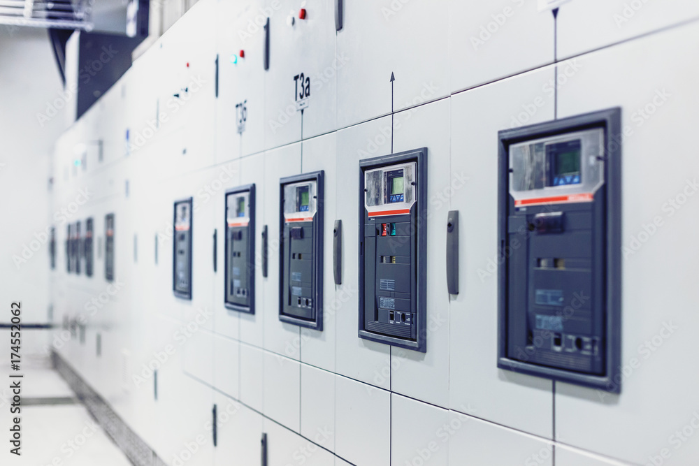 Fototapeta premium Electrical switchgear, Industrial electrical switch panel. Equipments, pipes in a modern thermal power plant