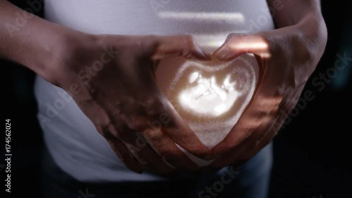  Growing foetus in the womb of expectant mother