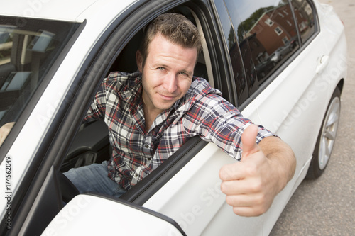 nice men with his brand new car photo