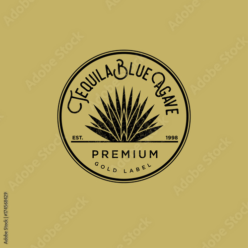 Tequila logo. Gold tequila label. Blue agave premium tequila. Agave in a circle on a yellow background
