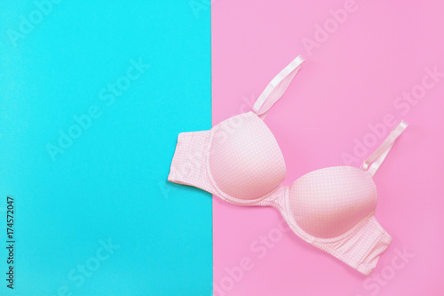 Bra on hanger on two tone background