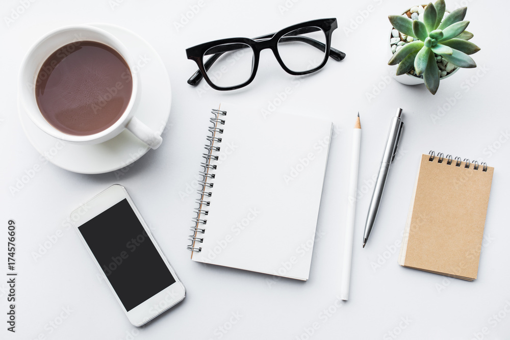 Business table top with mock up office supplies on white background.Flat lay.Copy space. Business table top with mock up office supplies on white background.Flat lay.Copy space.