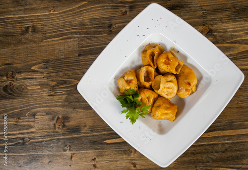 Fried Ravioli with Sauce on a wooden background. with copy space. top view
