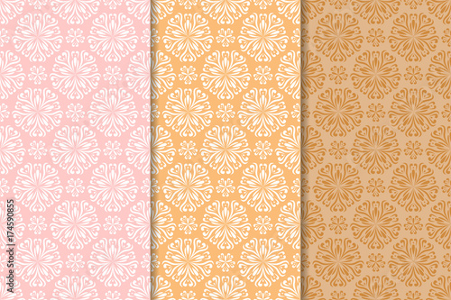 Set of floral colored seamless patterns. Pink and orange backgrounds