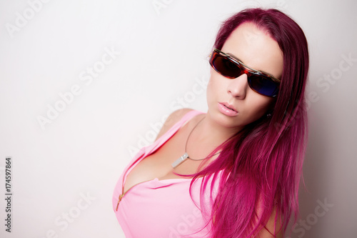 portrait girl in pink clothes with sunglasses