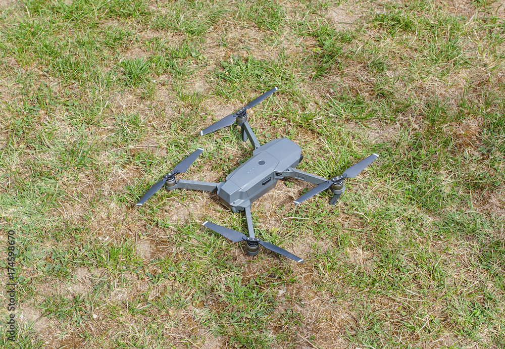 Naklejka premium Dron on the grass