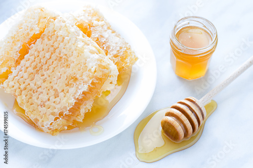 Honey and honeycomb on the table 