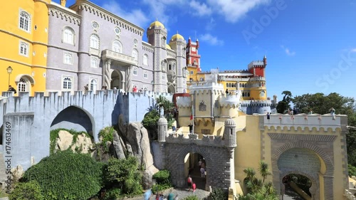 Architecture background. Pena National Palace, one of seven wonders of Portugal and Unesco Heritage Site. Pena Castle is a popular landmark. Municipality of Sintra near Lisbon. Sunny day, timelapse.