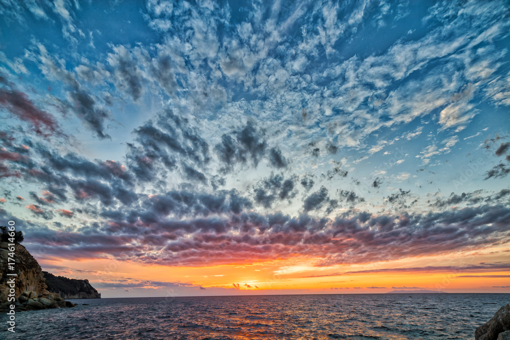 Scenic coastal sunset on island of Elba in Tuscany