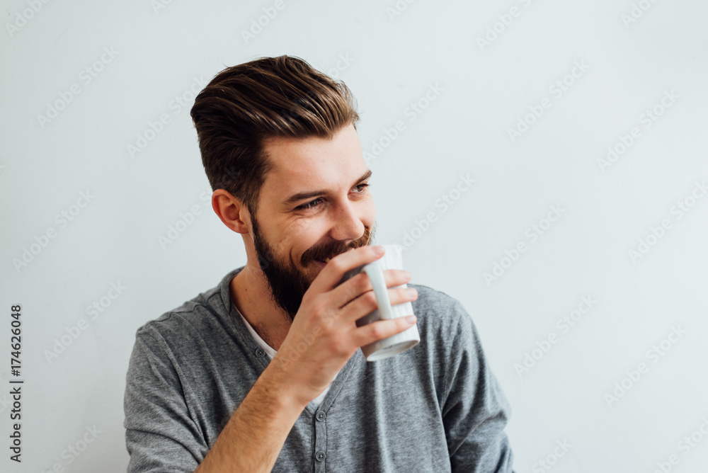 Handsome Bearded Man Having a Cup of Coffee Handsome Bearded Man Having a Cup of Coffee
