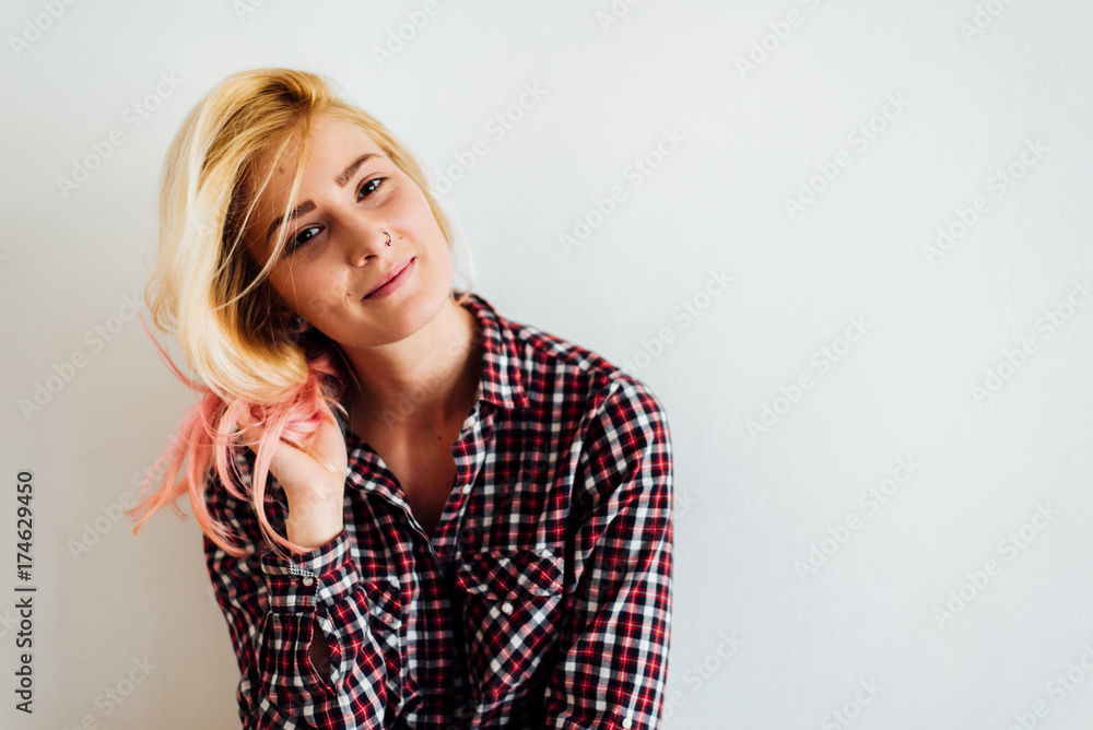 Portrait of a Blond Woman With Pink Highlight in Her Hair Portrait of a Blond Woman With Pink Highlight in Her Hair