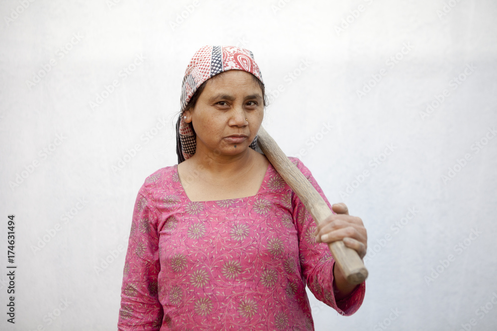 South Asian farmer against a white wall. South Asian farmer against a white wall.