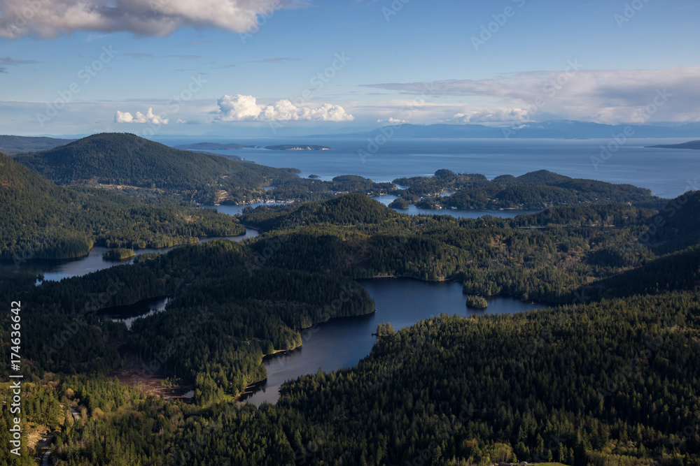 Mixal Lake in Sunshine Coast, British Columbia, Canada, during a cloudy evening from an Aerial View.