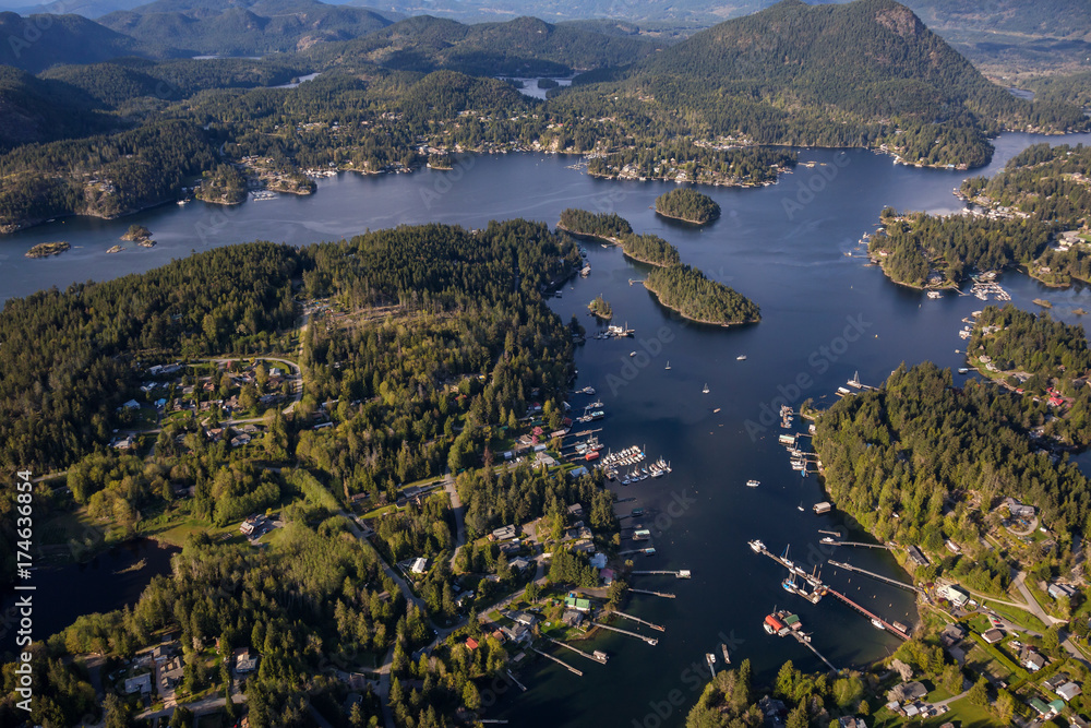 Beaver Island in Sunshine Coast, British Columbia, Canada, during a cloudy evening from an Aerial View.