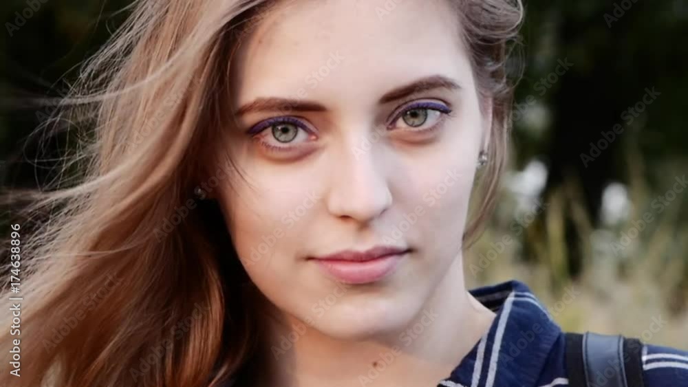 Portrait of a beautiful sexy woman smiling, happy girl with big full lips with green big eyes and blond hair Portrait of a beautiful sexy woman smiling, happy girl with big full lips with green big eyes and blond hair
