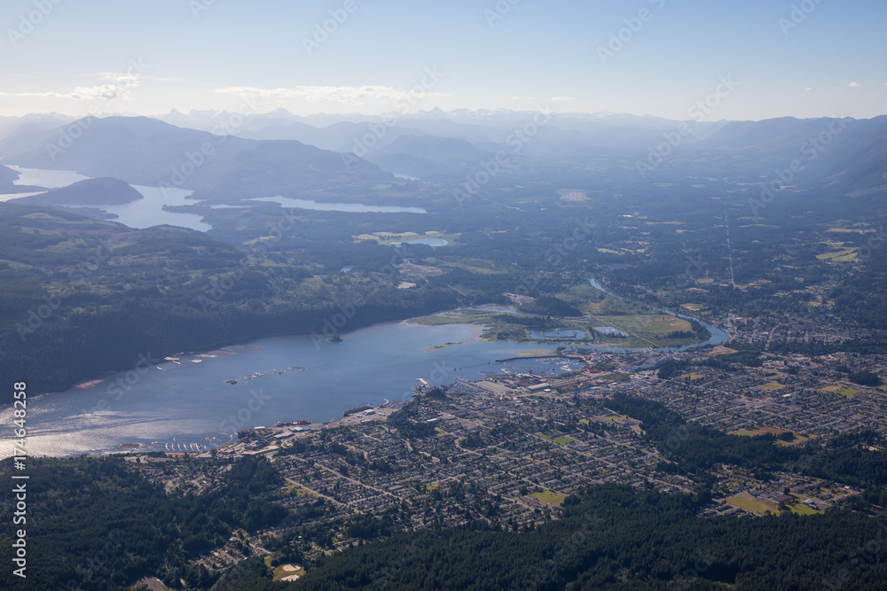 Small Town of Port Alberni on Vancouver Island, British Columbia, Canada. Taken from an aerial view during a sunny summer day.