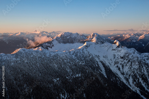 Aerial landscape view of the Vancouver North Shore Mountains in BC, Canada during sunset. © edb3_16