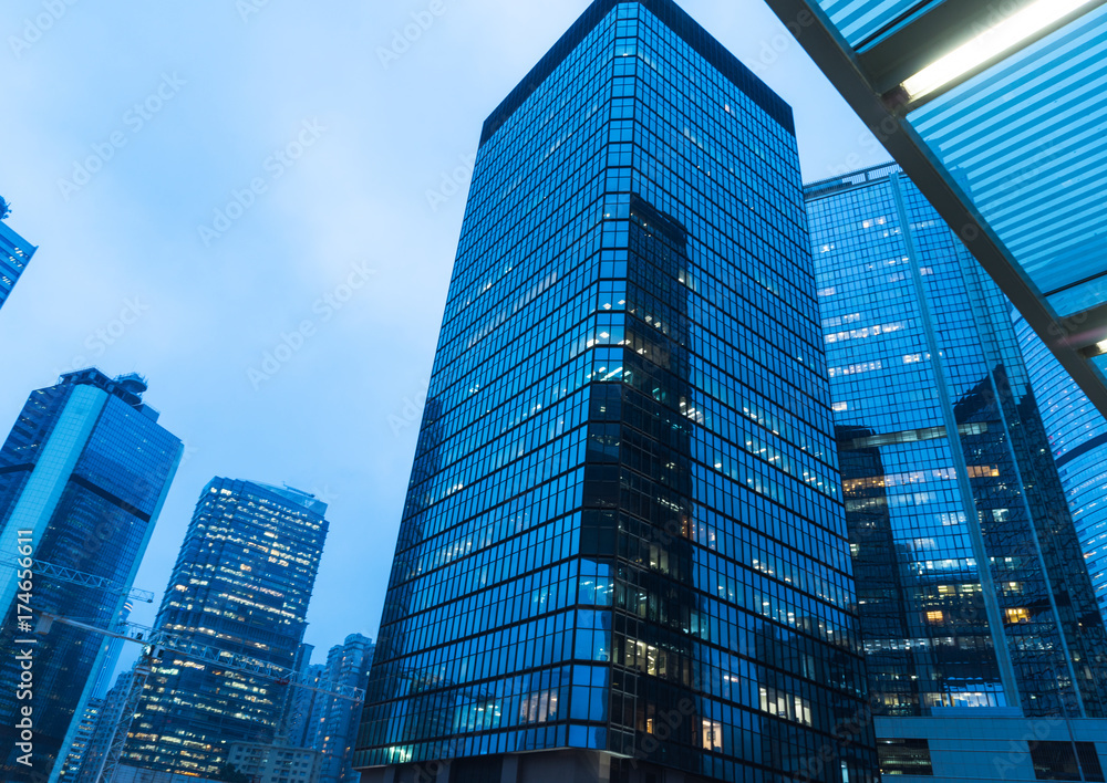 directly below of modern financial skyscrapers in central Hong Kong,blue toned,china.