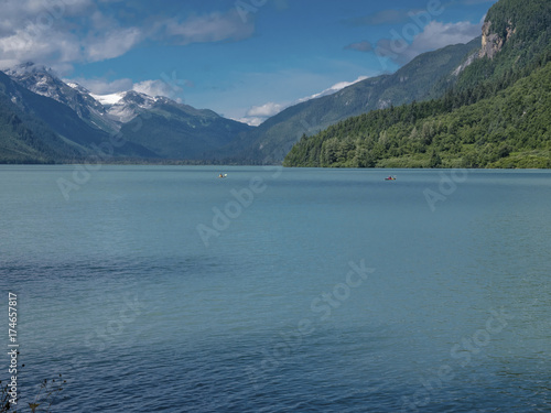 Two Kyaks in Chilkoot Lake-Haines: Kyaks in the distance, surrounded by magnificent Alaskan scenery. © Moelyn Photos