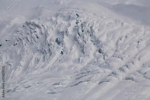 Wallpaper Mural Crevasse on top of a remote glacier mountain in British Columbia, Canada, viewed from airplane. Torontodigital.ca