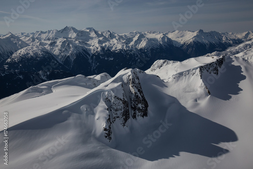 Aerial Landscape View of a Remote Glacier and Mountain Peaks in British Columbia, Canada.