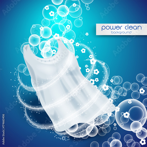 laundry detergent with close up that cleans dirt in clothing, light blue background