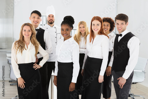 Portrait Of Confident Restaurant Staff photo