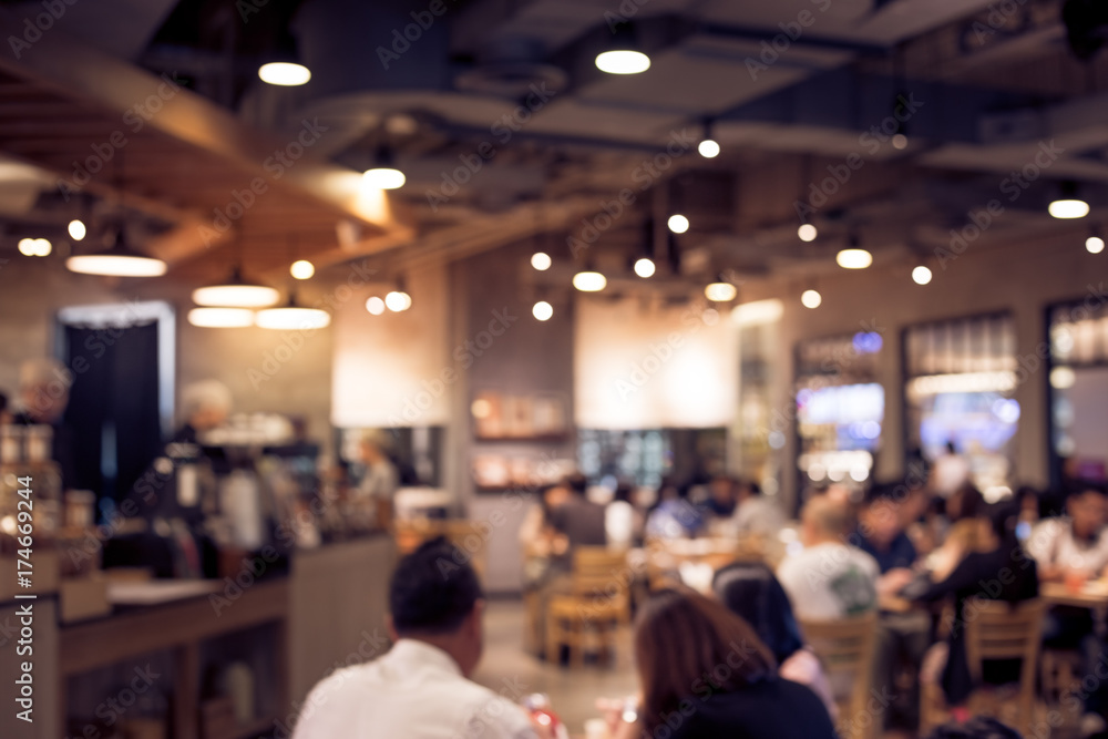 Blur coffee shop or cafe restaurant with abstract bokeh light.background idea