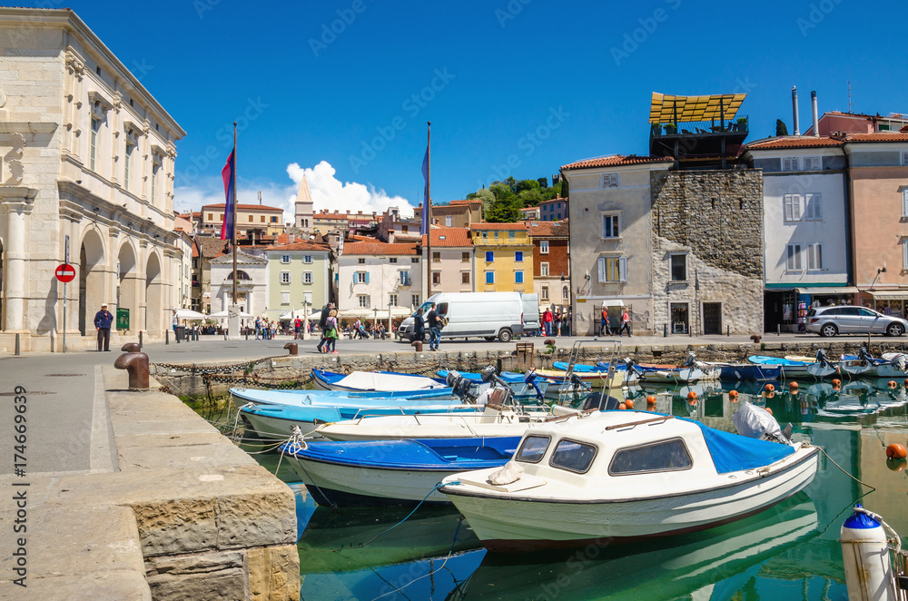 Beautiful old buildings and boats in the Harbor, Piran, Slovenia