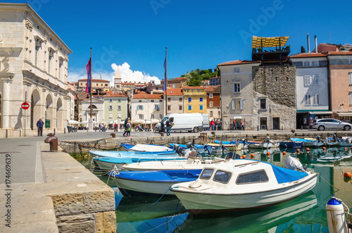 Beautiful old buildings and boats in the Harbor, Piran, Slovenia