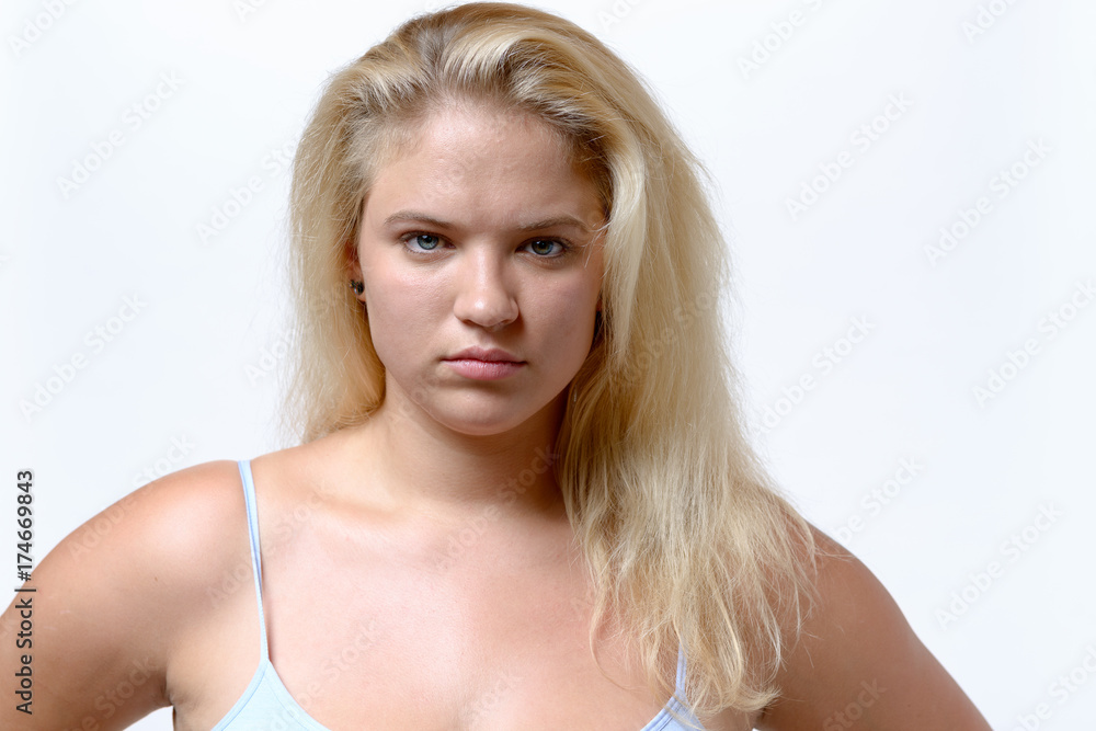 Obraz premium Sulky looking overweiht young woman