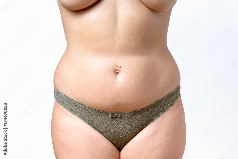 Mid section torso of an overweight curvy woman
