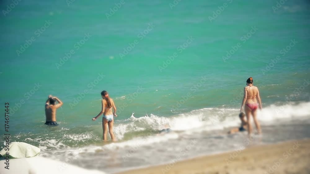 people bathe on the beach slow motion people bathe on the beach slow motion